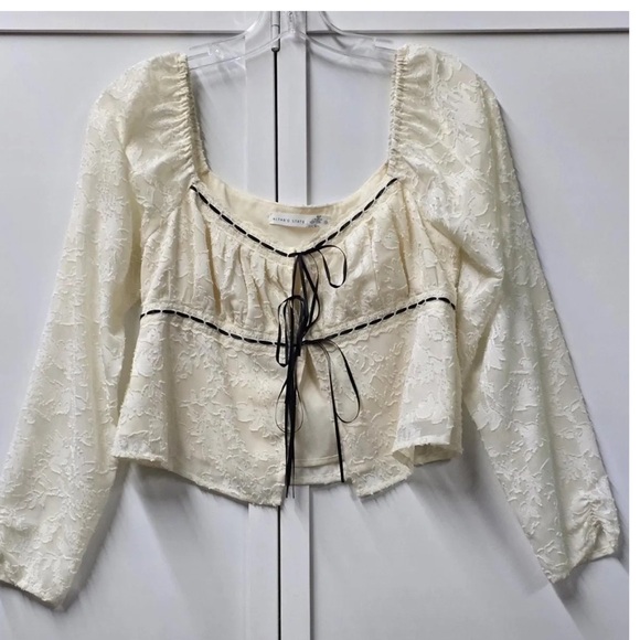 Altar'd State Cream Lace Tie-Front Long Sleeve Crop Top with Black Trim - Picture 2 of 4